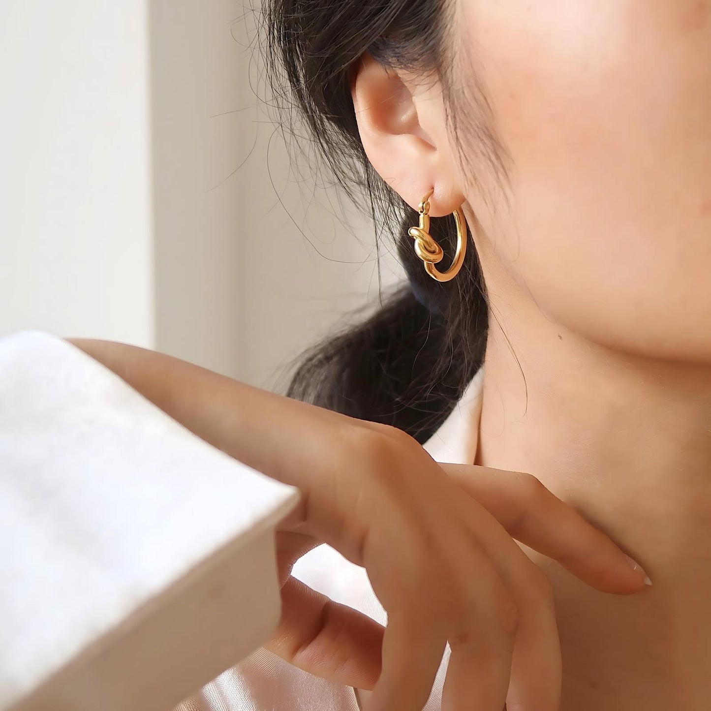 18K gold plated knot earrings side profile view UAE