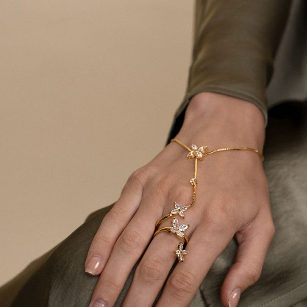 18K gold plated 4 stars hand chain flat lay UAE