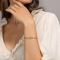 18K gold plated knot bracelet adjustable side view UAE