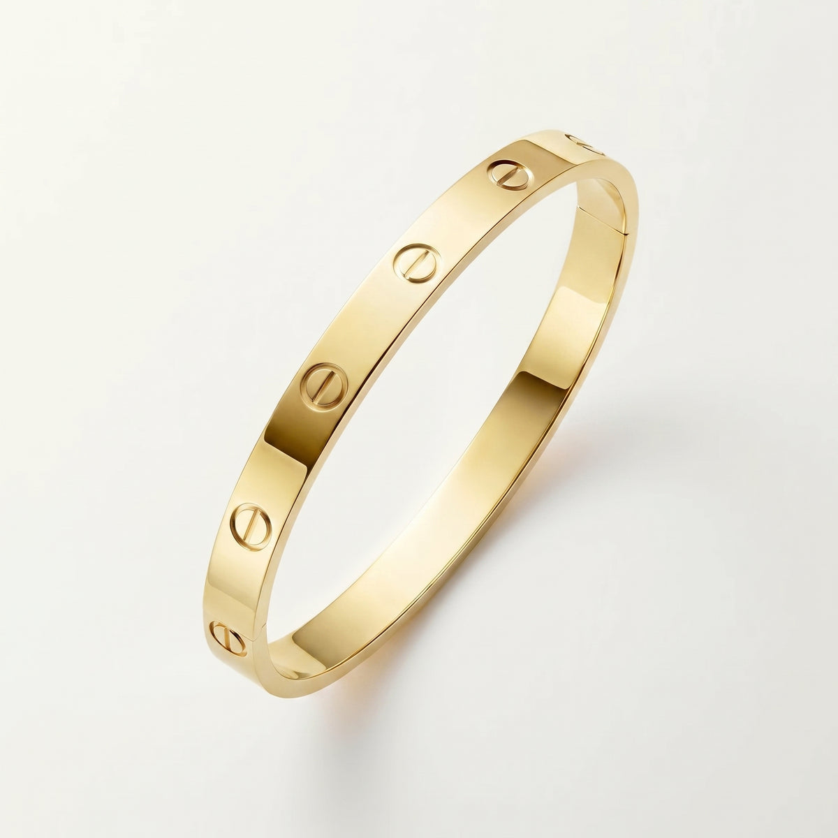 18K gold plated screw bangle gold stainless steel UAE Jewelique