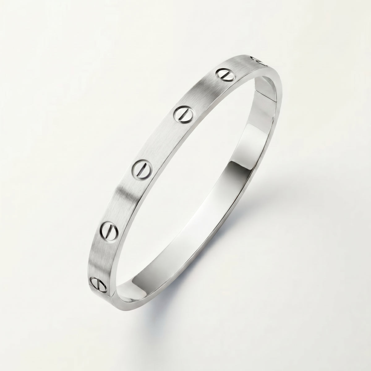 18K gold plated screw bangle silver stainless steel UAE Jewelique