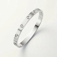 18K gold plated screw bangle silver stainless steel UAE Jewelique