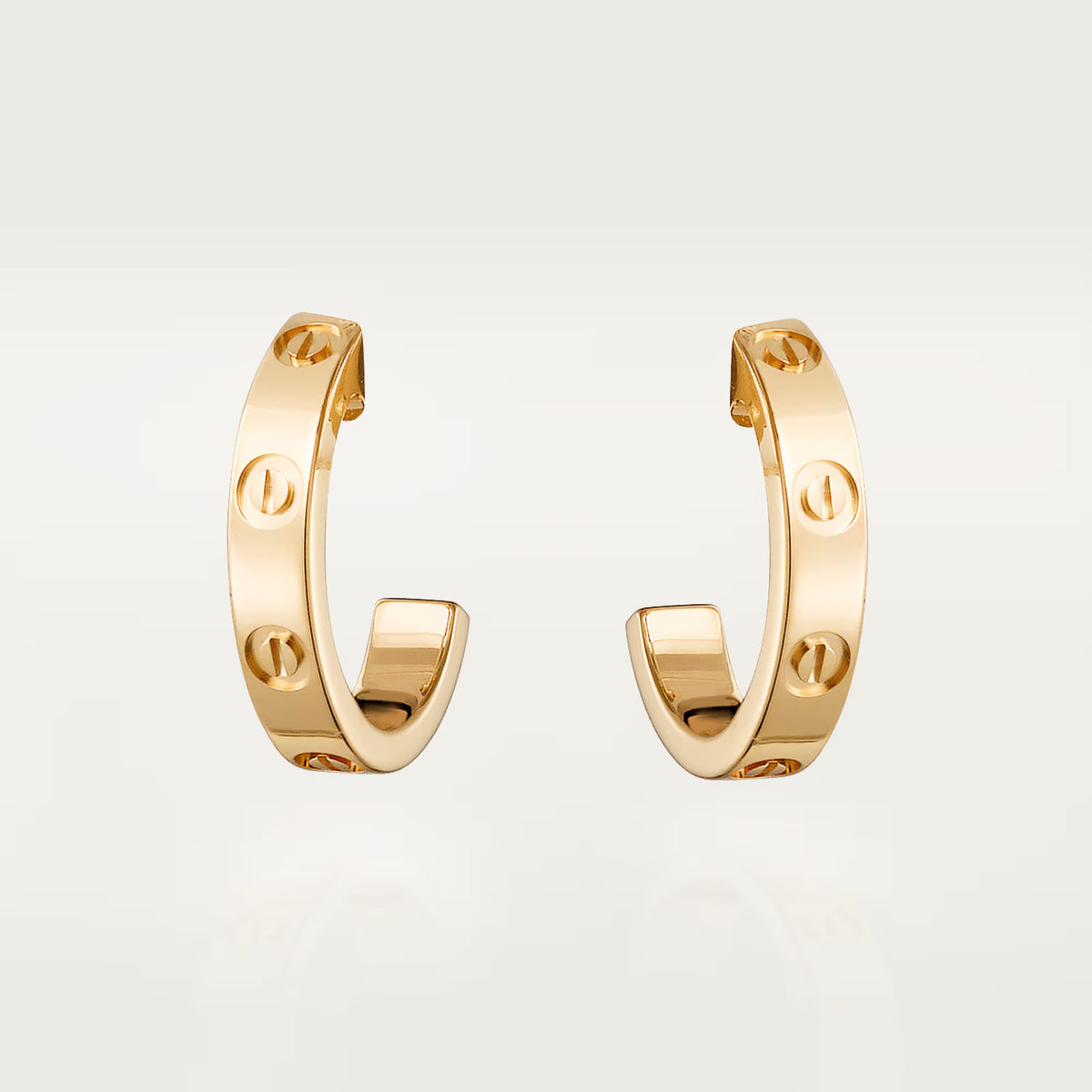 18K gold plated screw earrings gold stainless steel UAE Jewelique