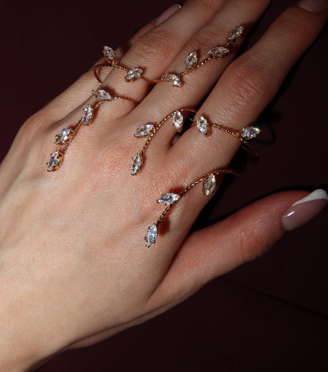 18K gold plated triple ring minimalist chain close-up UAE