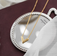18K gold plated V necklace worn model UAE