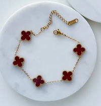 18K Gold Plated VC Bracelet in dark red — worn wrist | Jewelique UAE